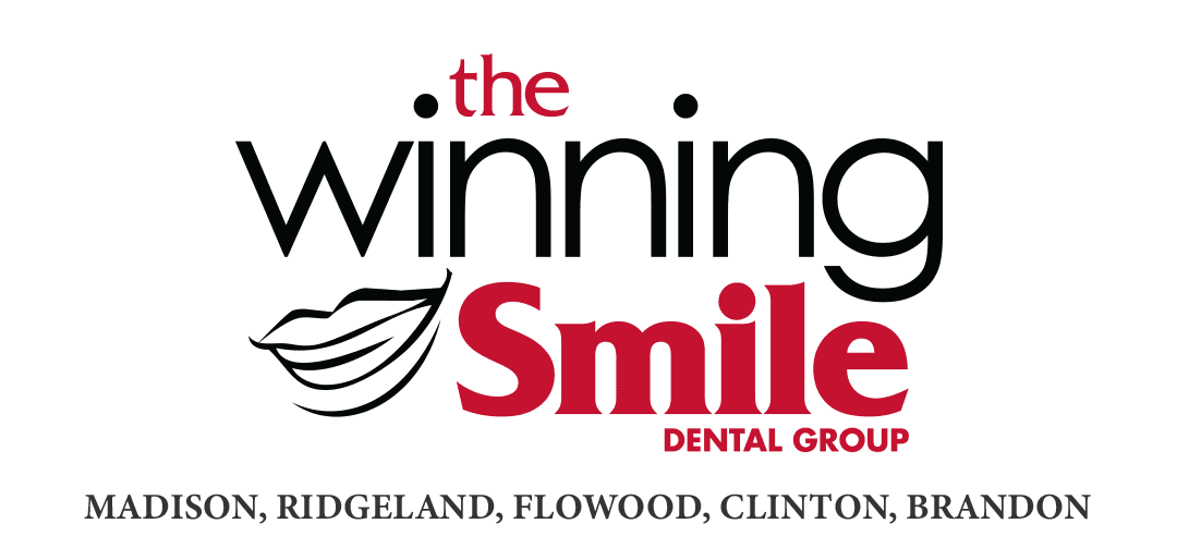 The image features a logo for "the winning Smile Dental Group," with stylized text and a graphic of a smiling mouth. Below the logo are the words "MADISON, RIDGELAND, FLOWOOD, CLINTON, BRANDON."